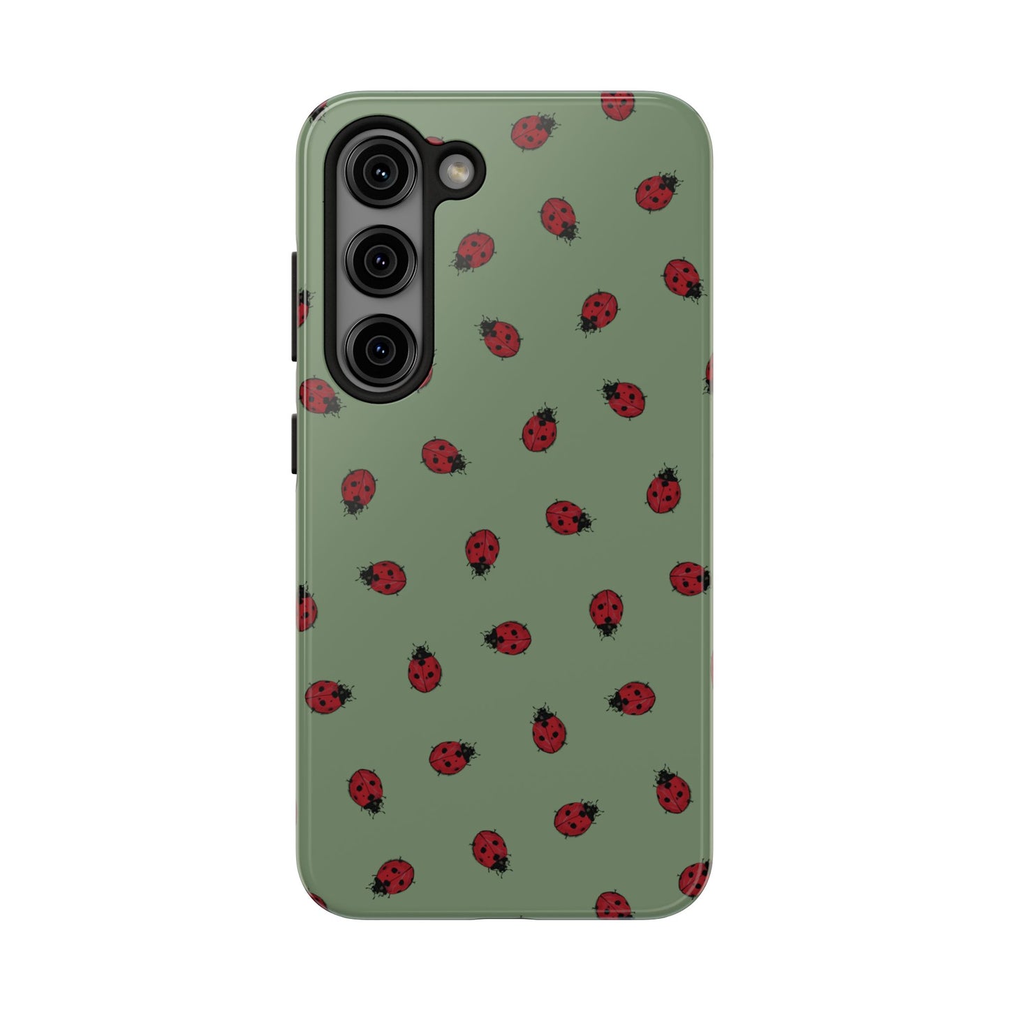 Phone case with ladybug pattern on a green background