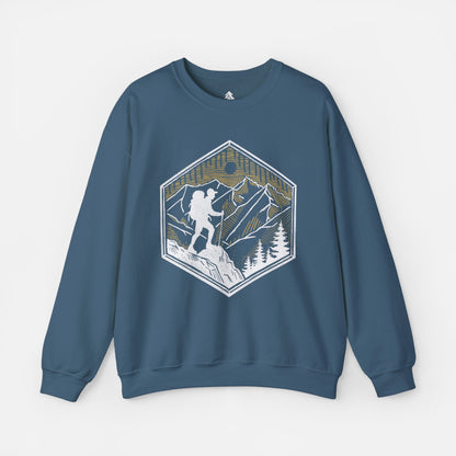 Solid indigo Skyline Trek Sweatshirt displayed flat on a white background, showcasing its cozy fabric and outdoor-inspired hiking design.