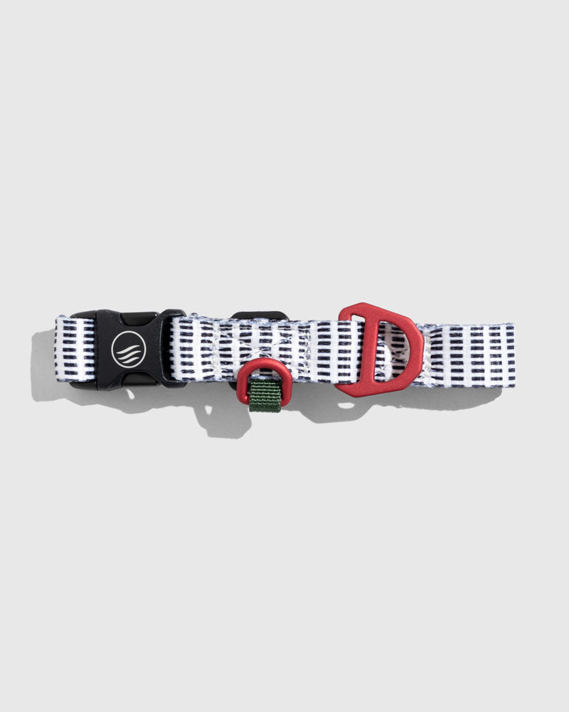 Crafted from 100% (R)evolution™ recycled polyester made from post-consumer plastic bottles the Recycled Woven Dog Collar in Shortbread from United By Blue is displayed on a white background.