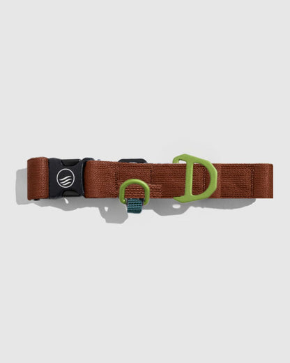 Crafted from 100% (R)evolution™ recycled polyester made from post-consumer plastic bottles the Recycled Woven Dog Collar in Terracotta from United By Blue is displayed on a white background.