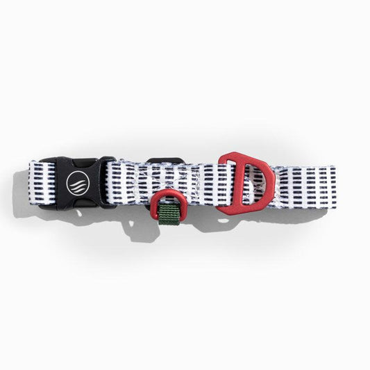 Crafted from 100% (R)evolution™ recycled polyester made from post-consumer plastic bottles the Recycled Woven Dog Collar in Shortbread color from United By Blue is displayed on a white background.