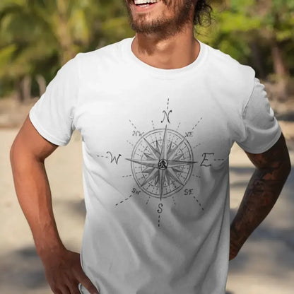 Model wearing The True North Compass 100 percent cotton Unisex T-Shirt by Kempain, white, available in sizes Small through 5XL.