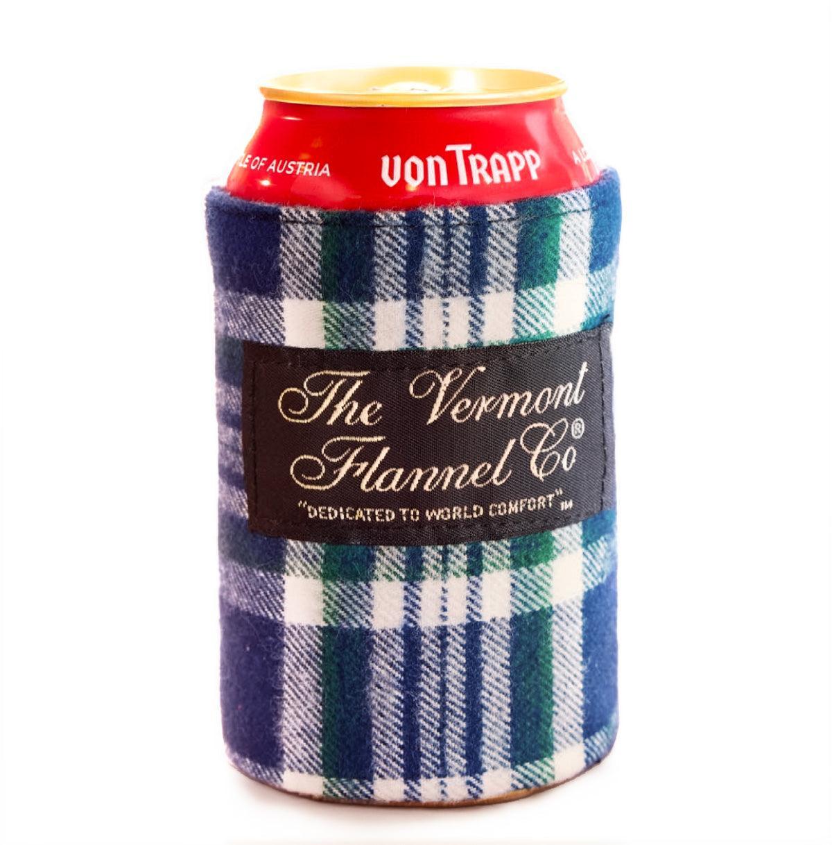 Plaid can cooler with 'Von Trapp' branding on a white background