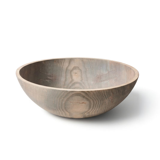 Wooden bowl with a natural grain pattern on a white background