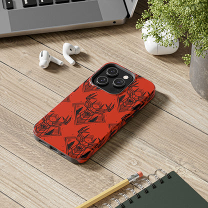 Antler Buck iPhone Case in orange, front view on a desk, featuring a bold antler and buck design for hunters.