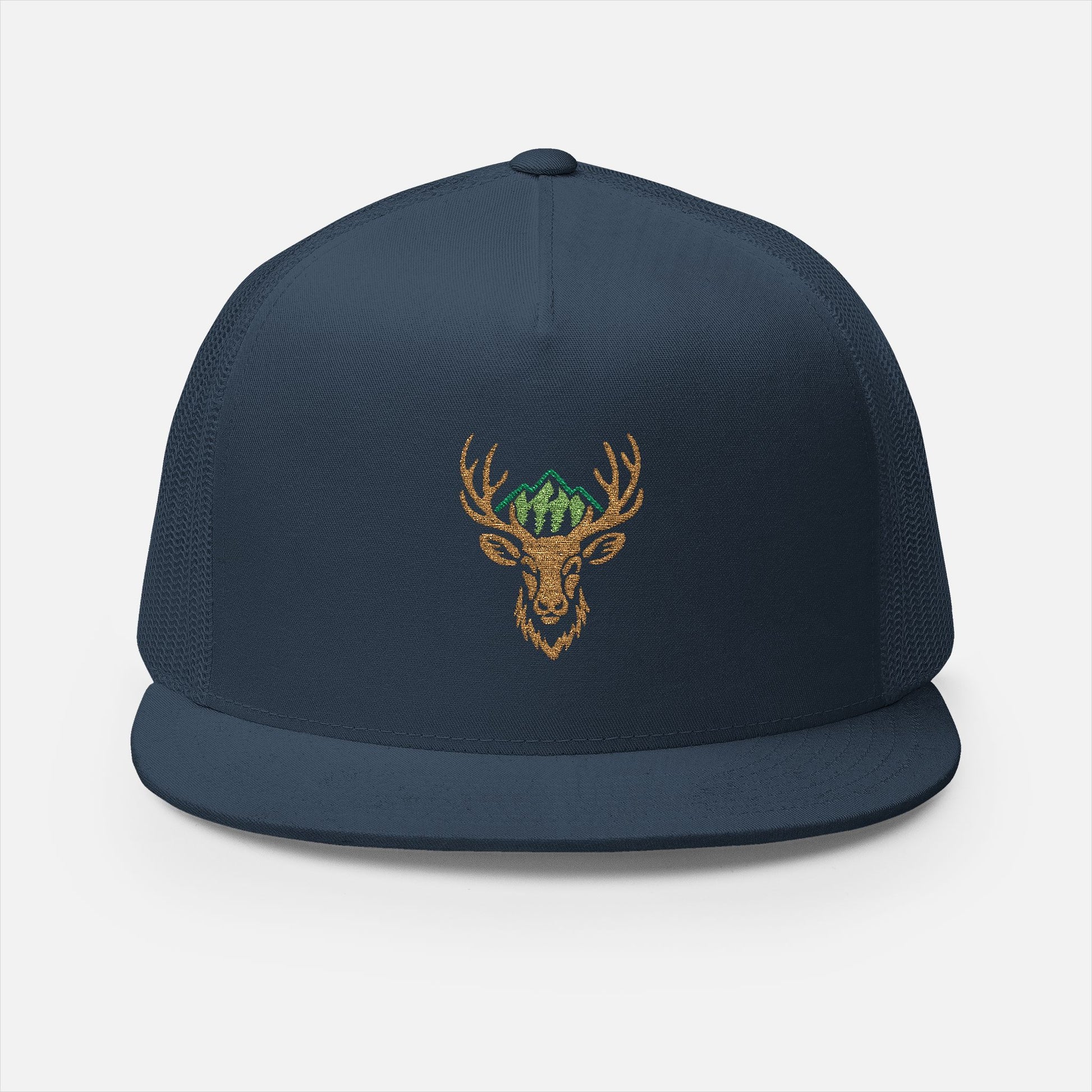 Front view of the Antlered Deer Head Trucker Cap in navy on a white background, featuring an embroidered design of a majestic deer head with antlers framed by mountains and pine trees.