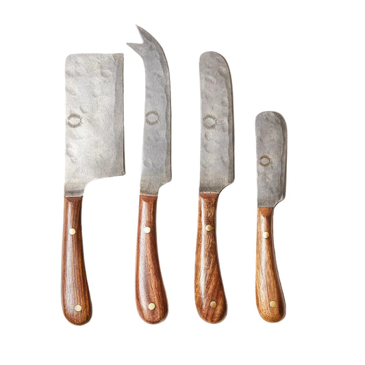 Set of four knives with wooden handles on a white background