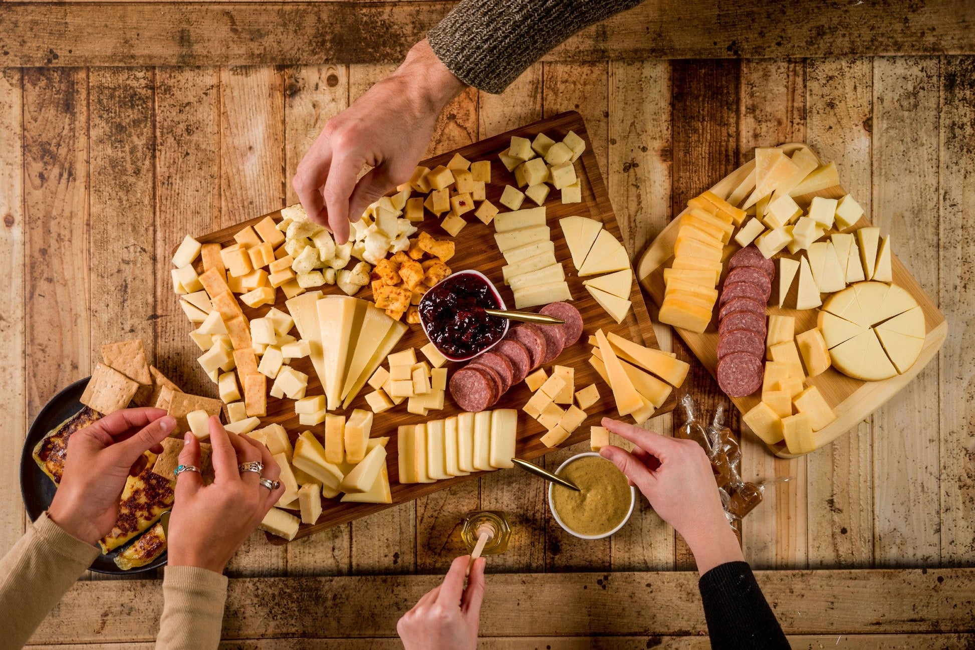 Ultimate Wisconsin Cheese Heritage Gift Box with 15-Year Aged Cheddar, 17 Artisan Blocks, Curds, and Bamboo Board.