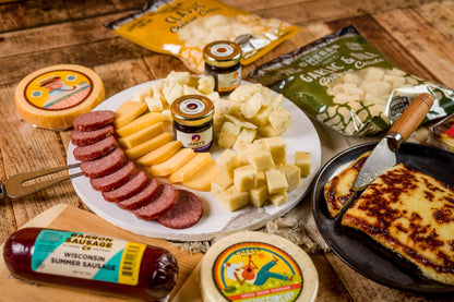 Ultimate Wisconsin Cheese Heritage Gift Box with 15-Year Aged Cheddar, 17 Artisan Blocks, Curds, and Bamboo Board.