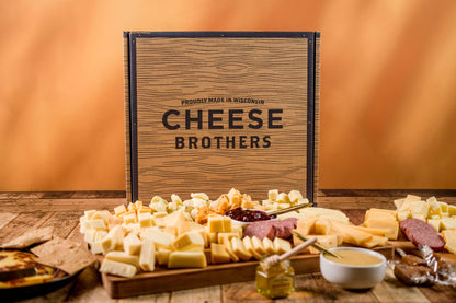 Ultimate Wisconsin Cheese Heritage Gift Box with 15-Year Aged Cheddar, 17 Artisan Blocks, Curds, and Bamboo Board.