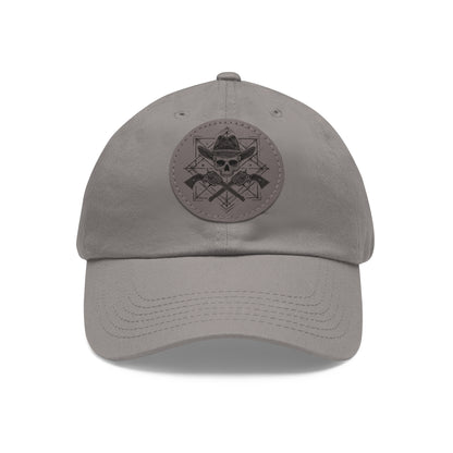 Front of cowboy skull cap by Kempain Family Outfitters showing design of the patch with skull wearing a cowboy hat and pistols crossed in a geometric illustration. 