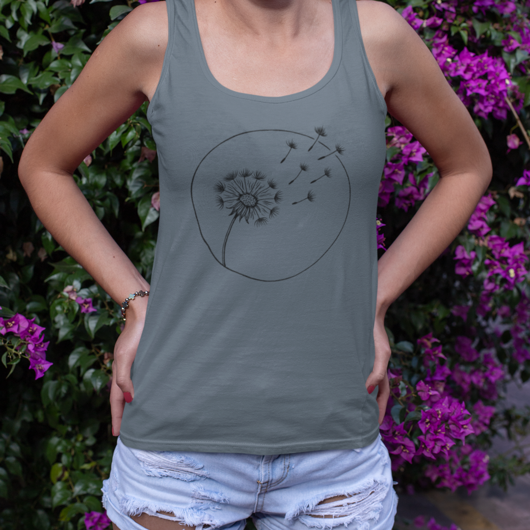 Dandelion Breeze Tank featuring a delicate dandelion and drifting seeds, worn by a model for fit and style display.