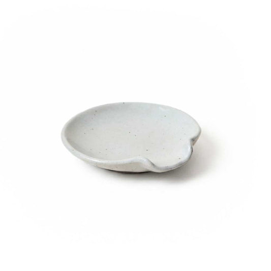 Farmhouse Pottery handmade stoneware spoon rest in speckled white glaze, crafted in Vermont.