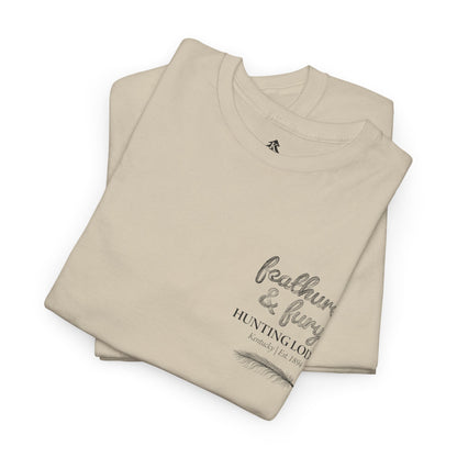 Sand color folded Feathers & Fury Hunting Lodge Tee on a white background, highlighting its comfortable fabric and detailed turkey hunting graphic.