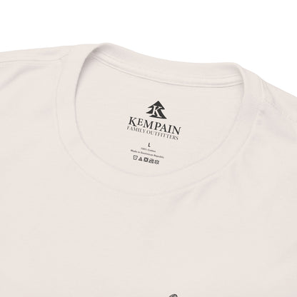 Close up of tag Feathers & Fury Hunting Lodge Tee on a white background, highlighting the Kempain Family Outfitters logo on tag.