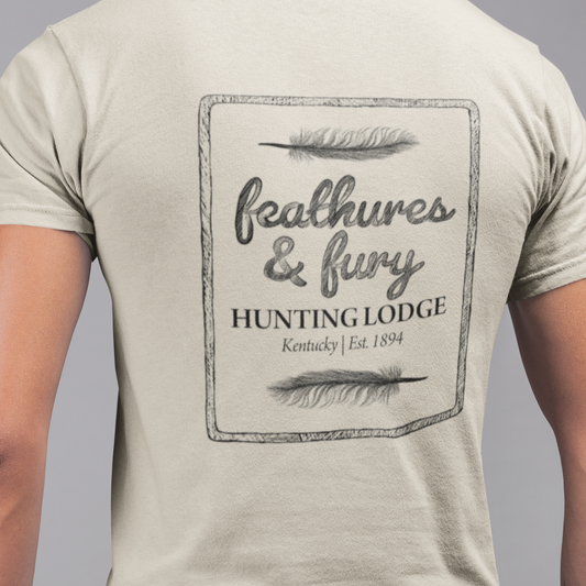 Sand Feathers & Fury Hunting Lodge Tee back view on model, showcasing a bold hunting-inspired design for turkey hunters.