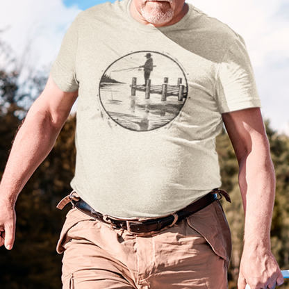 Model wearing sand colored Fisherman Dockside Tee, featuring a geometric illustration of a fisherman on a dock, perfect for anglers and outdoor enthusiasts.
