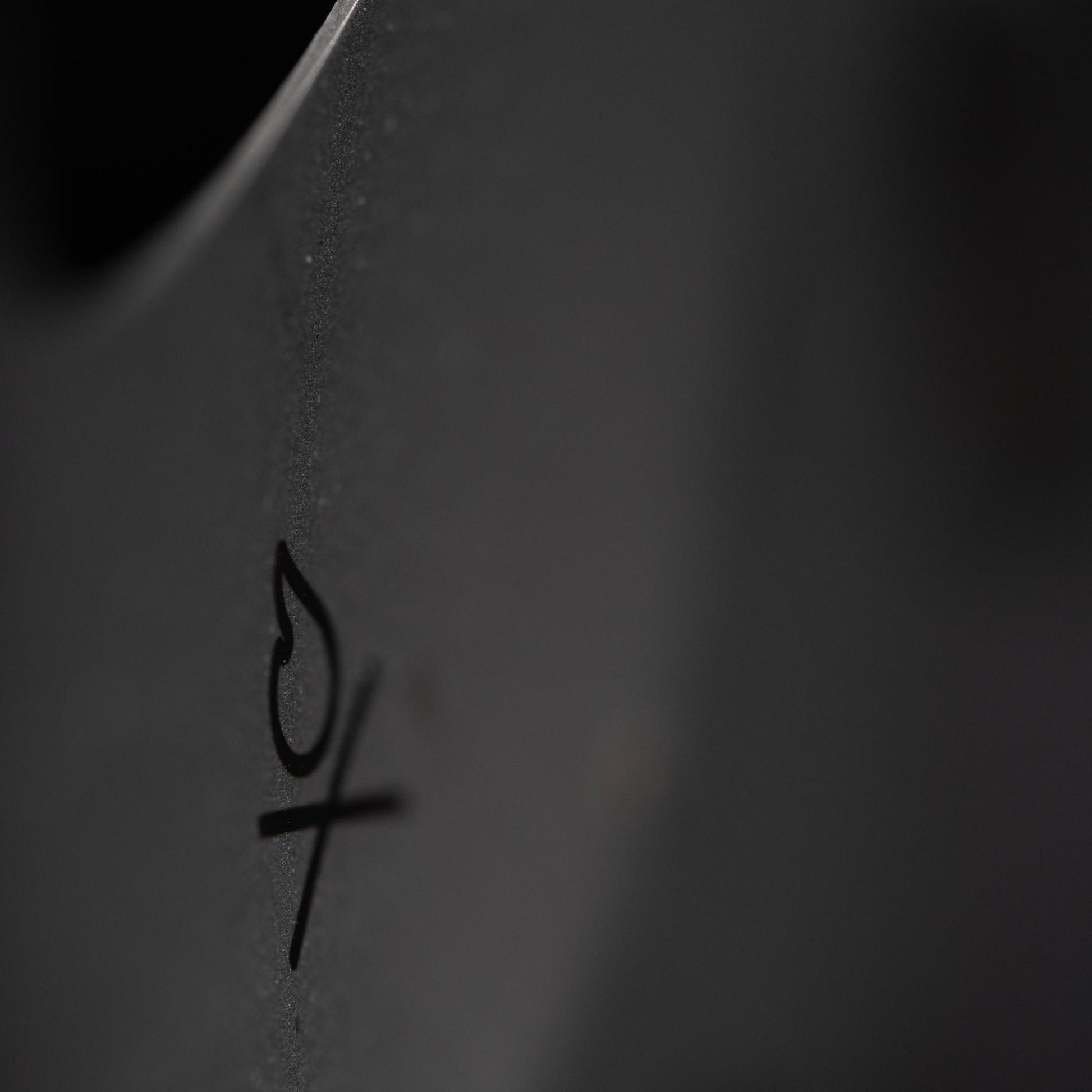 The Stöker Stove by Überleben closeup image of logo.