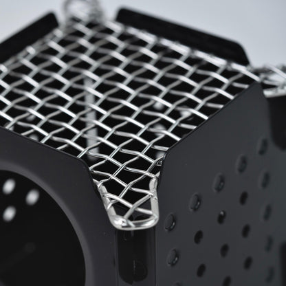 The Stöker Stove by Überleben featuring close of grate hardware. 
