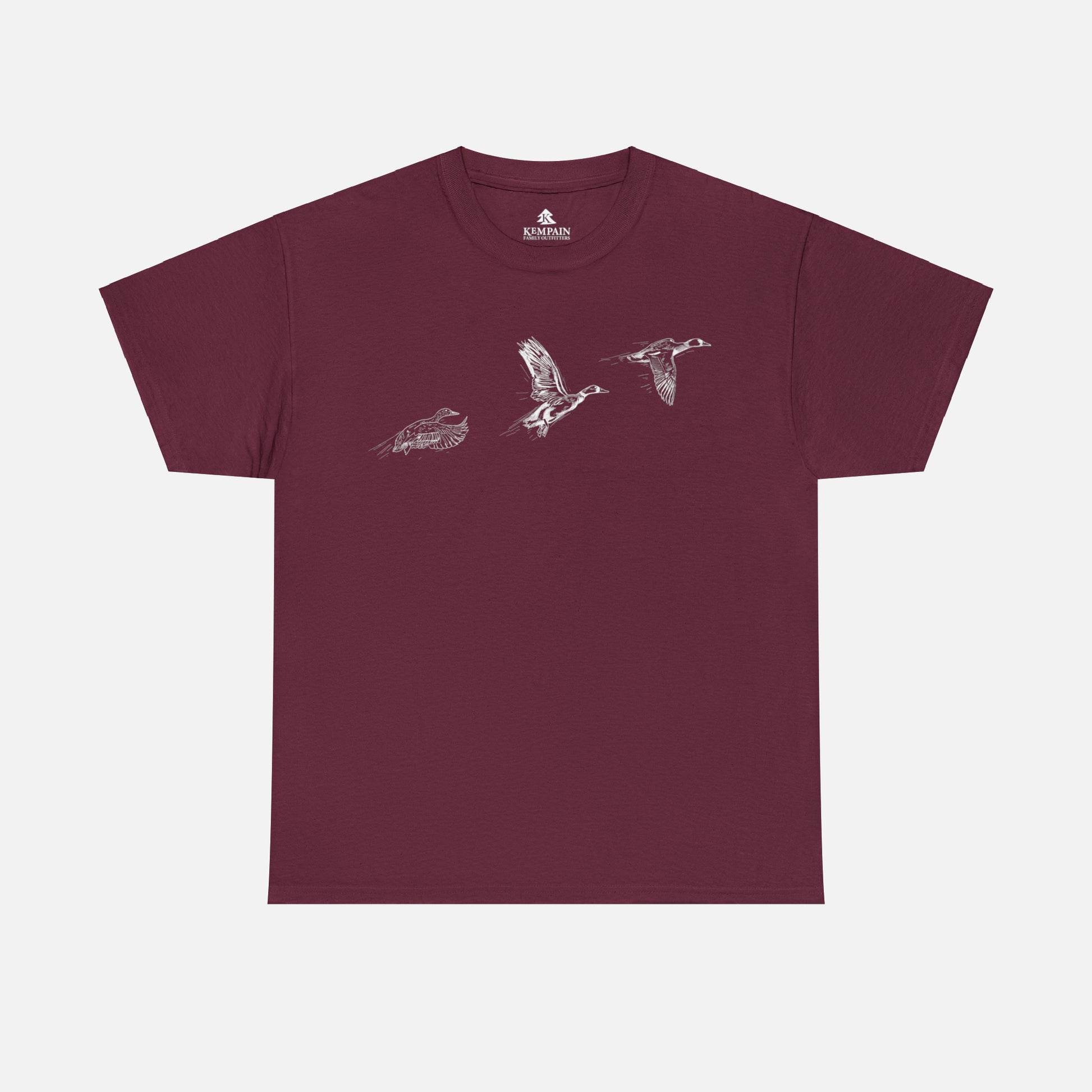Three flying ducks silhouette on a maroon t-shirt on white background.