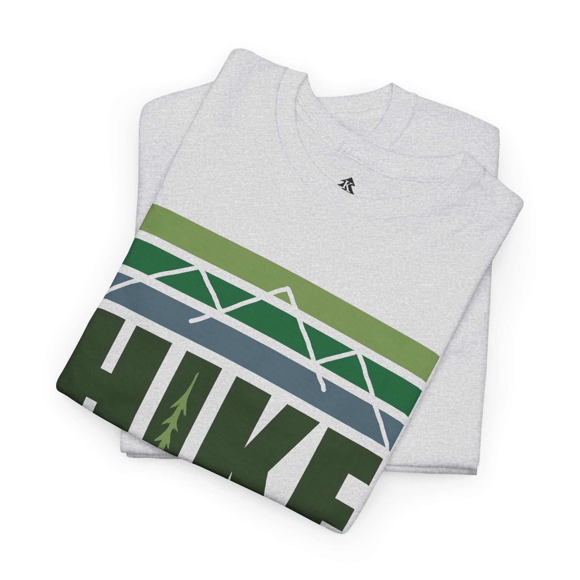 Folded Hike Mountain Graphic T-Shirt on a white background in gray color, showcasing the bold mountain and tree design, perfect for hikers and outdoor adventure lovers.