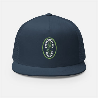 Front view of the Hiking Boot Typography Trucker Cap in navy on a white background, featuring a bold hiking boot filled with intricate typographic linework and outdoor-themed details.
