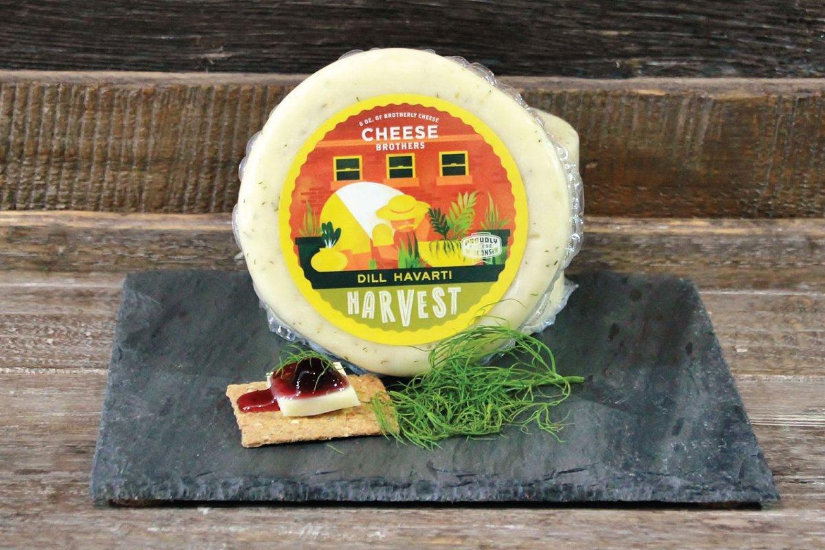 A Housewarming Gift Pack featuring Cheese Brothers 8-Year Aged Cheddar and Artisan Dill Havarti curated by Kempain Family Outfitters.