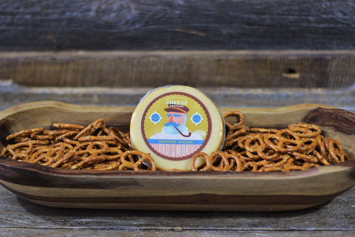 A Housewarming Gift Pack featuring Cheese Brothers 8-Year Aged Cheddar and Artisan Dill Havarti curated by Kempain Family Outfitters.