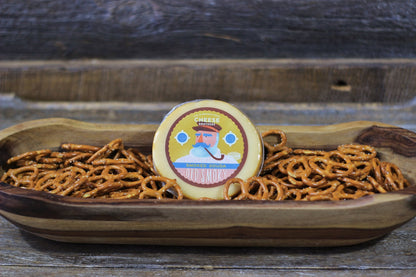 A Housewarming Gift Pack featuring Cheese Brothers 8-Year Aged Cheddar and Artisan Dill Havarti curated by Kempain Family Outfitters.