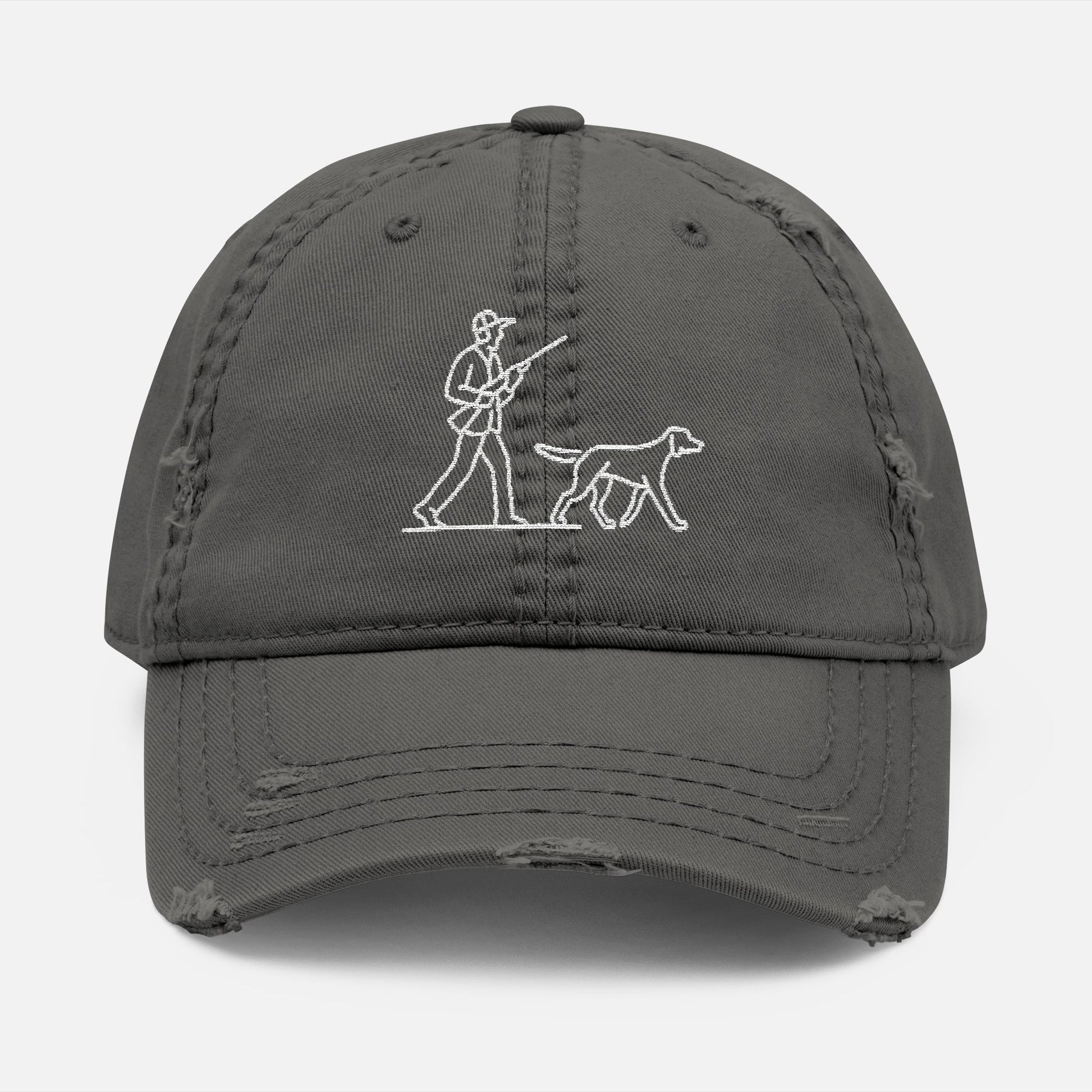 Front view of grey low-profile dad hat with line art embroidery of a hunter and dog in classic outdoor scene.