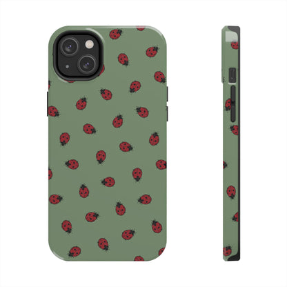 Phone case with ladybug pattern on a green background