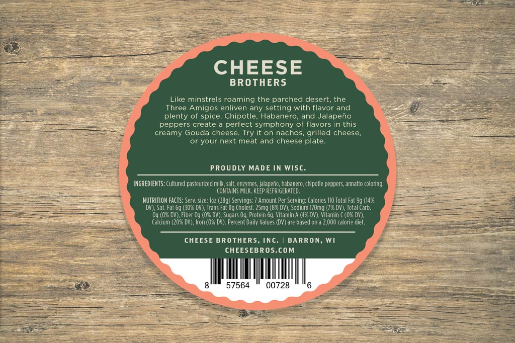 Round label with 'Cheese Brothers' branding on a wooden background