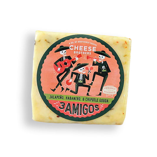 Jalapeno, habanero, chipotle gouda cheese block with 'Three Amigos' label on white background.