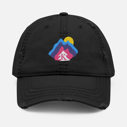  Front view of black distressed dad hat on white background, featuring an embroidered mountain and sun design with the Kempain Family Outfitters tree + K emblem.