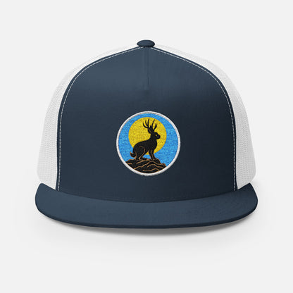 Front view of navy/white trucker cap featuring embroidered jackalope silhouette and moonrise design in white thread.