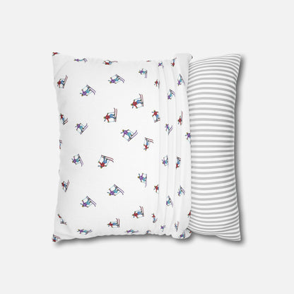Pillow case with an illustrated skier pattern, partially fitted over a pillow on a white background, demonstrating how it goes over the pillow with the 'Carving the Slopes' design.