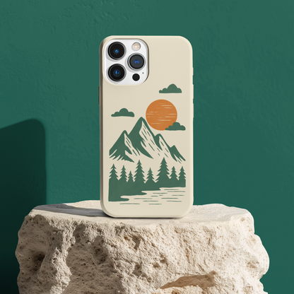Pine & Mountain Sunrise Phone Case styled on a rocks, showcasing rugged outdoor aesthetic and design details.