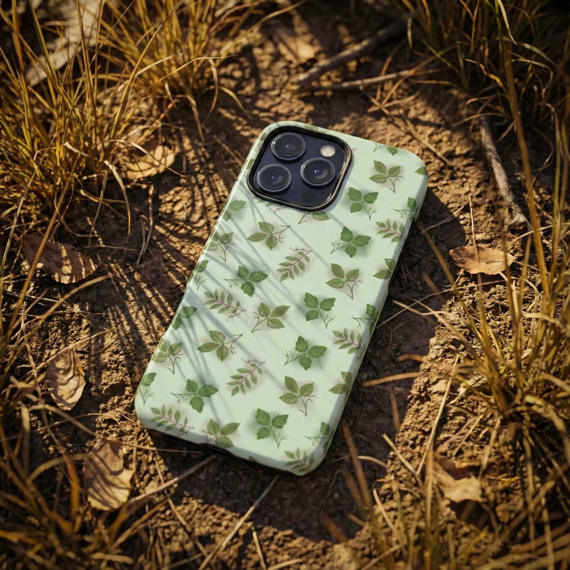 Phone case with  poisonous leaf pattern on a natural background