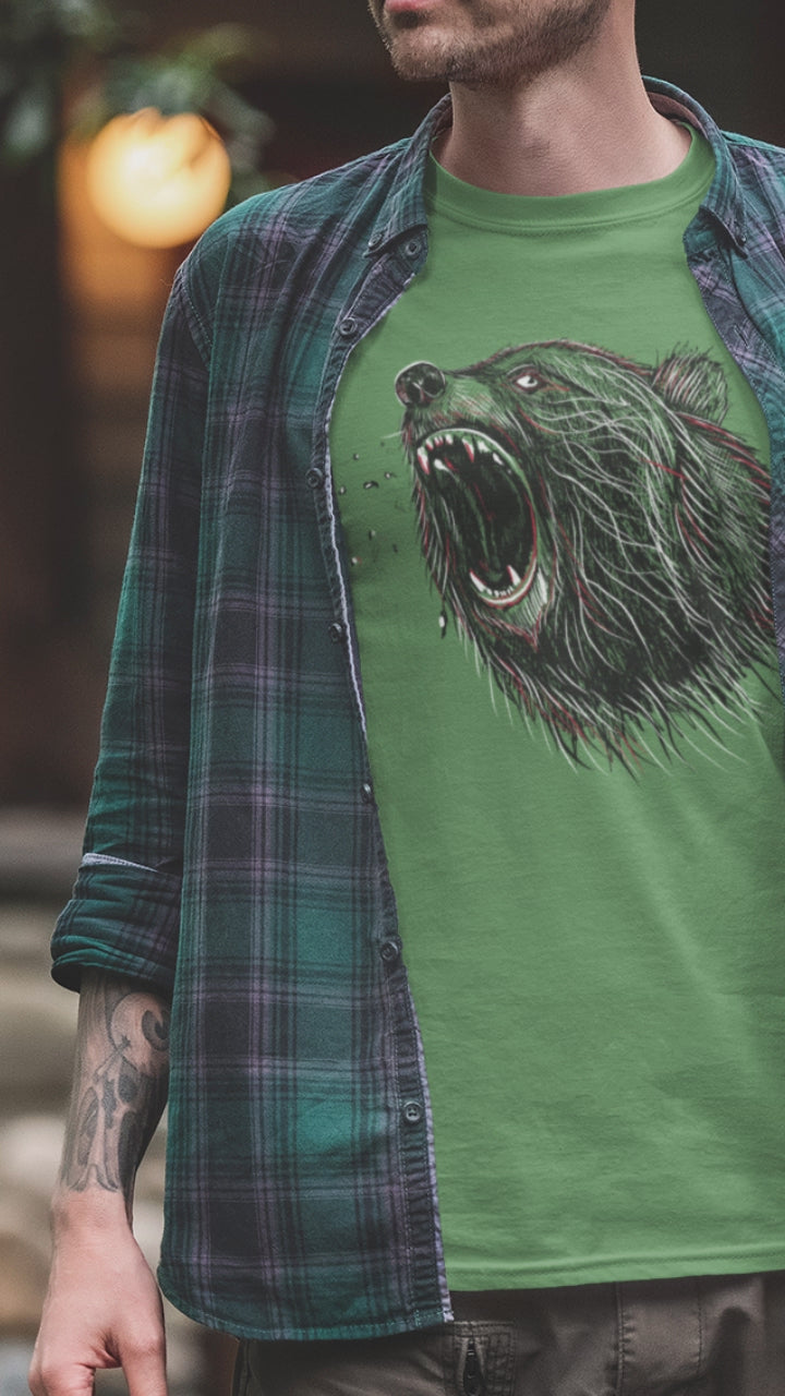Model wearing Green Roaring Bear T-shirt unisex nature and wildlife graphic tee on white background.