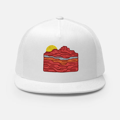 Front design of Bold trucker cap featuring a sun rising over red canyon layers. Rugged, adventurous style for outdoor lovers. Ideal for hiking, camping, and summer wear.