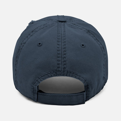 Back view of navy rustic-style dad hat with adjustable strap, showcasing classic unstructured fit for casual outdoor wear.