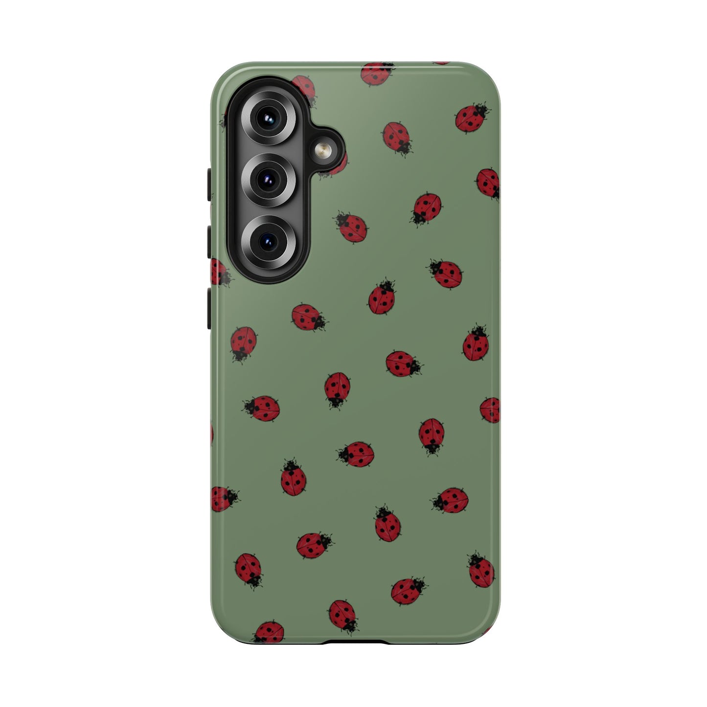 Phone case with ladybug pattern on a green background