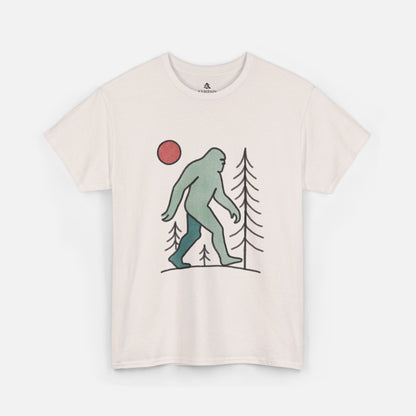 Flat lay of the Sasquatch Red Moon Forest Tee in ice grey color on a white background, featuring a minimalist line art design of Bigfoot walking through pine trees under a red moon