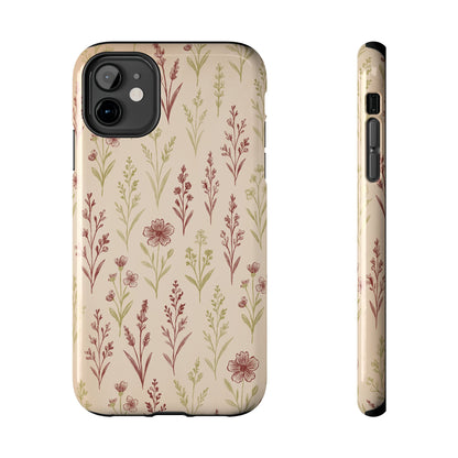 A classic Wildflower Pattern iPhone 11 case showcasing illustrated wildflowers by Jordan Kempain displayed on a white background.