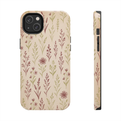 A classic Wildflower Pattern iPhone 14 Plus case showcasing illustrated wildflowers by Jordan Kempain displayed on a white background.