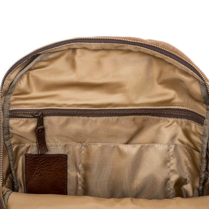 The inside zipper view of the Waxed Canvas Backpack in Smoke-Brown by Mission Mercantile Leather Goods.