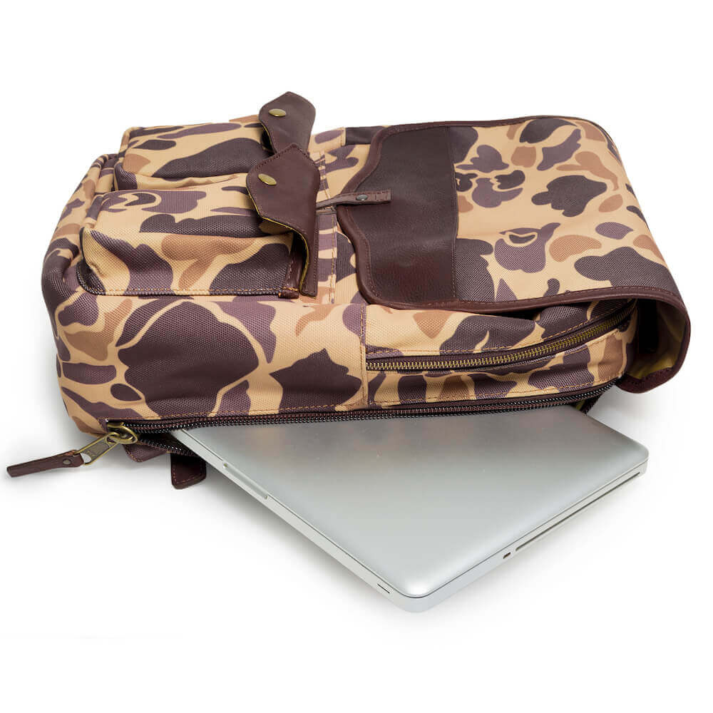 The Waxed Canvas Backpack in Smoke-Vintage-Camo with laptop storage by Mission Mercantile Leather Goods.