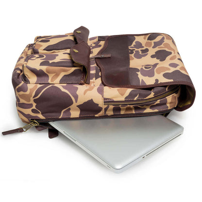The Waxed Canvas Backpack in Smoke-Vintage-Camo with laptop storage by Mission Mercantile Leather Goods.