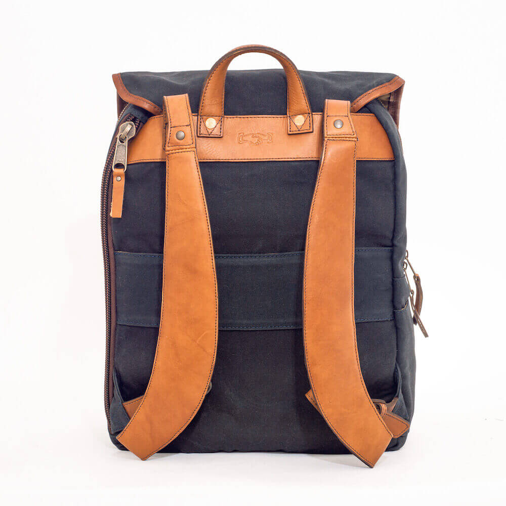Back view of The Waxed Canvas Backpack in hickory-navy by Mission Mercantile Leather Goods.