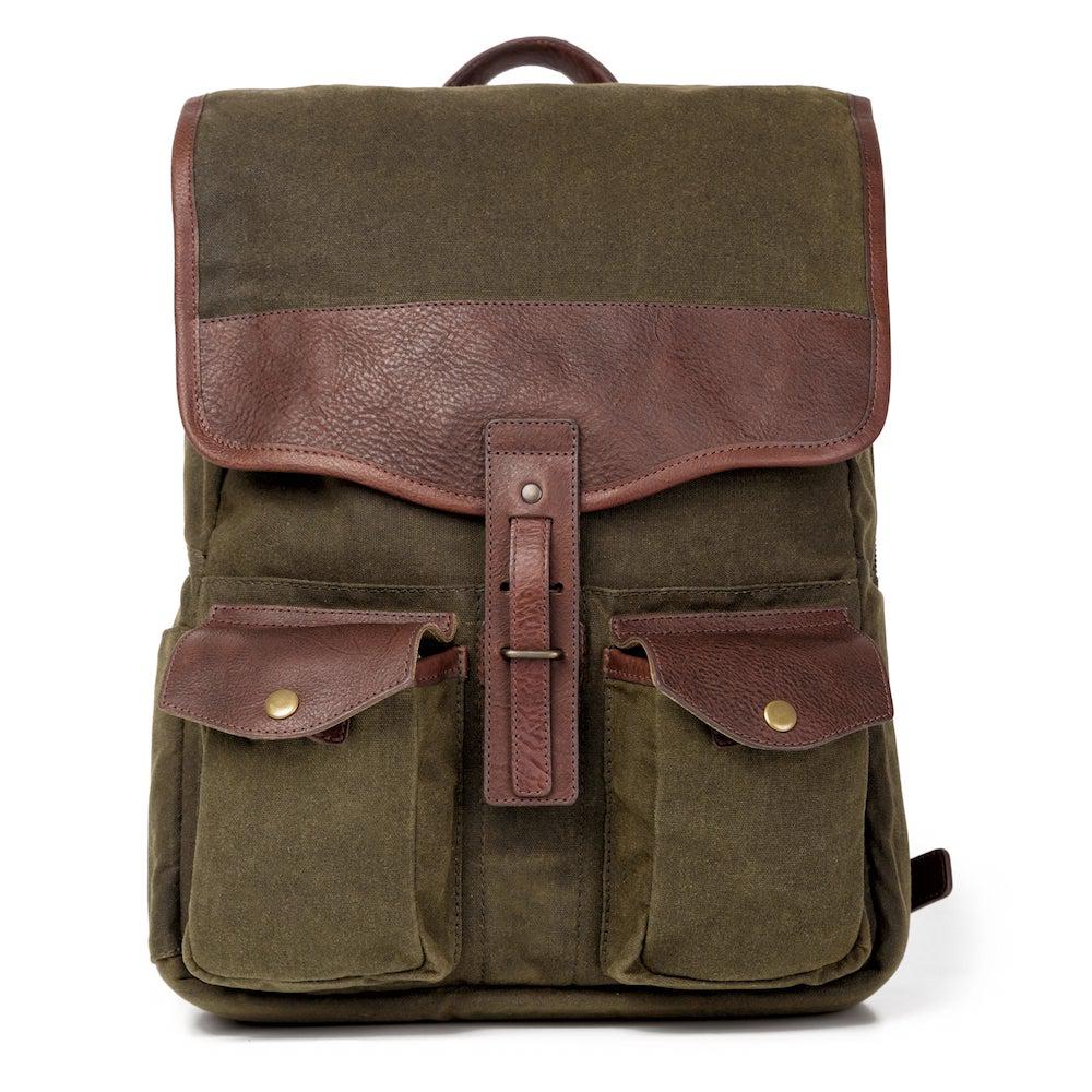 Front view of The Waxed Canvas Backpack in smoke-forest by Mission Mercantile Leather Goods on a white background.